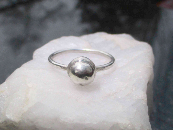 A handmade size 7 silver ball stacking ring made with recycled 925 sterling silv