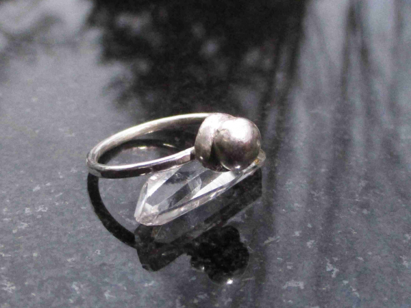 A handmade size 7 silver ball stacking ring made with recycled 925 sterling silv