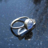 A handmade Blue Kyanite Silver Stacking Ring made with a natural faceted, blue k