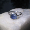 A handmade Blue Kyanite Silver Stacking Ring made with a natural faceted, blue k