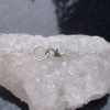 A handmade Oregon sunstone silver necklace. Made with a rough Oregon Sunstone crystal and 925 sterling silver. This Sunstone is clear to light yellow in color and bezel set in a pendant with an open back. Oregon Sunstone is a type of Feldspar and is unique to Oregon! * All 925 Sterling Silver * Necklace Length: 17 Inches * Pendant 1 inch long x 1/2 in. wide * Stone measurements : 4 x 13 x 10 mm.  This necklace is ready to ship. If ordered, you will receive the necklace pictured. Thanks for looki A handmade Oregon sunstone silver necklace. Made with a rough Oregon Sunstone cr