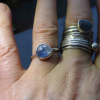 A handmade Blue Kyanite Silver Stacking Ring made with a natural faceted, blue k