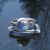 A handmade Blue Kyanite Silver Stacking Ring made with a natural faceted, blue k