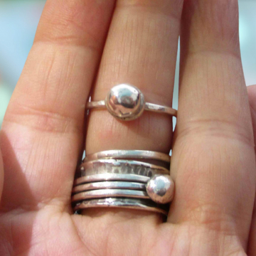 A handmade size 7 silver ball stacking ring made with recycled 925 sterling silver from other projects. The silver ball is 6 mm and is set on base of solid silver and set a thin, hammered 925 sterling silver band.  This ring is ready to ship. If ordered, you will receive the ring pictured. Thanks for looking. A handmade size 7 silver ball stacking ring made with recycled 925 sterling silv